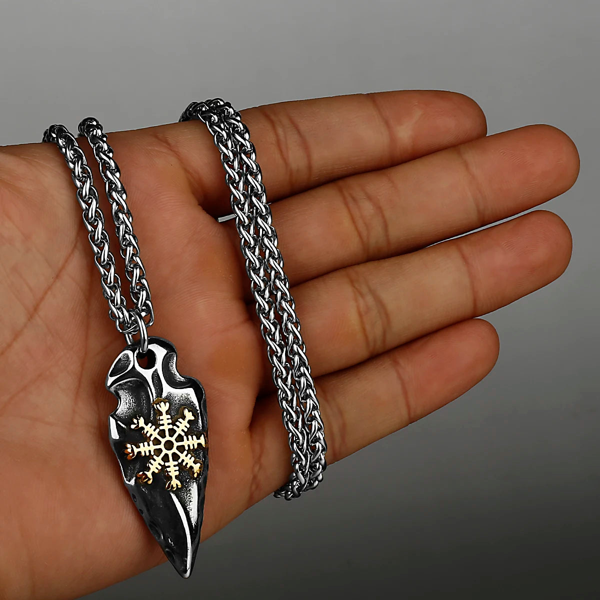 Gold Nordic compass arrow head