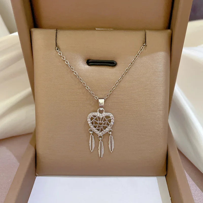 Three feather heart necklace