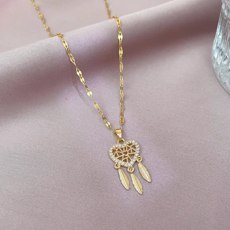 Three feather heart necklace