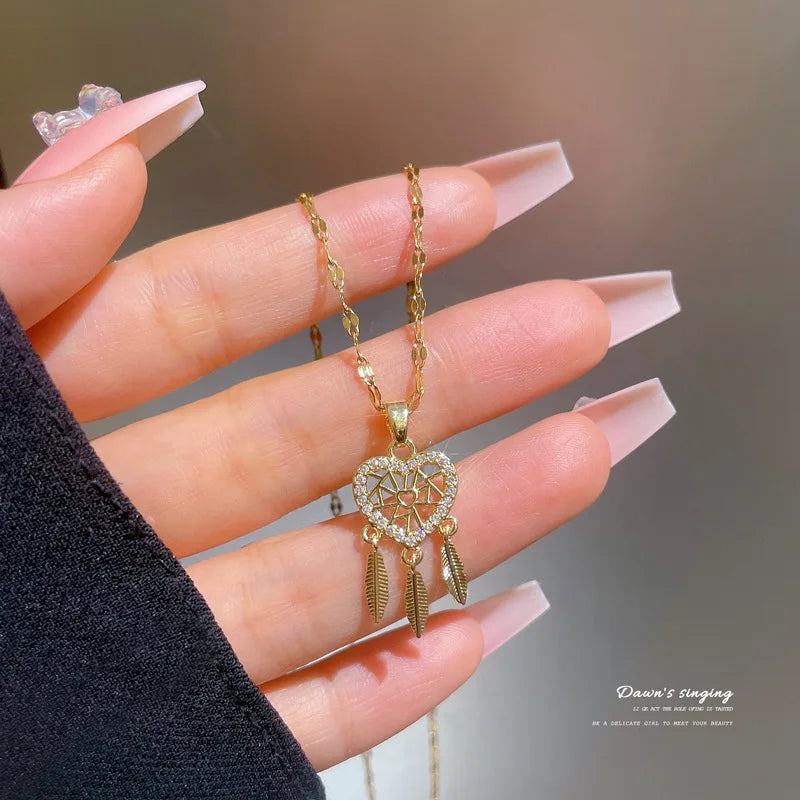 Three feather heart necklace