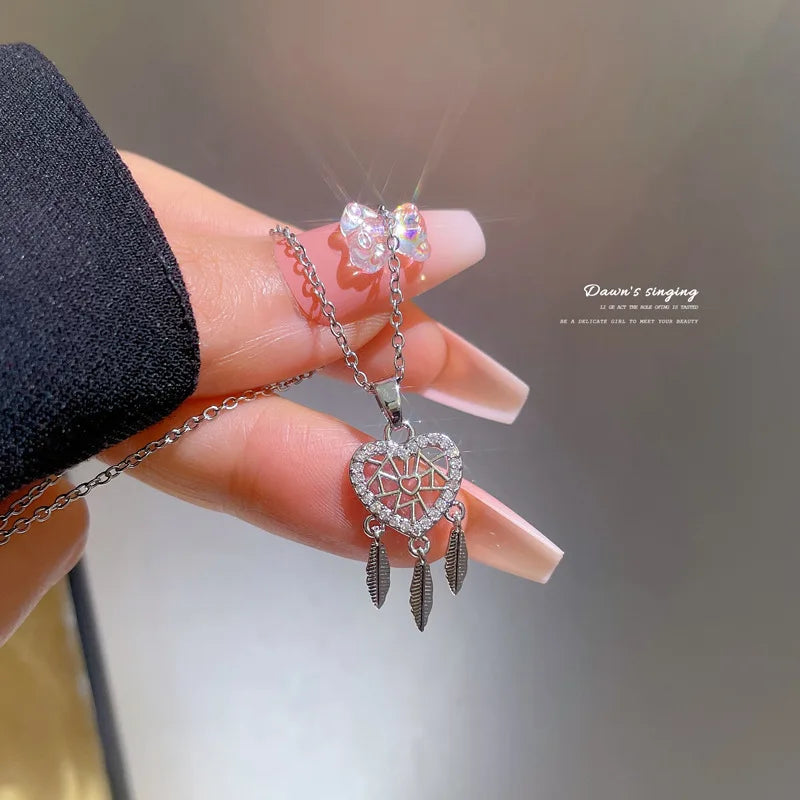 Three feather heart necklace