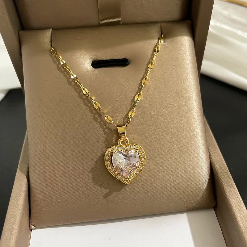 Three feather heart necklace