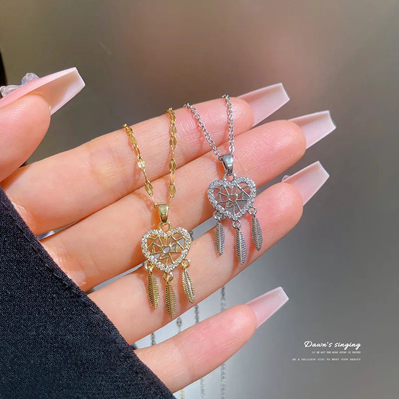 Three feather heart necklace